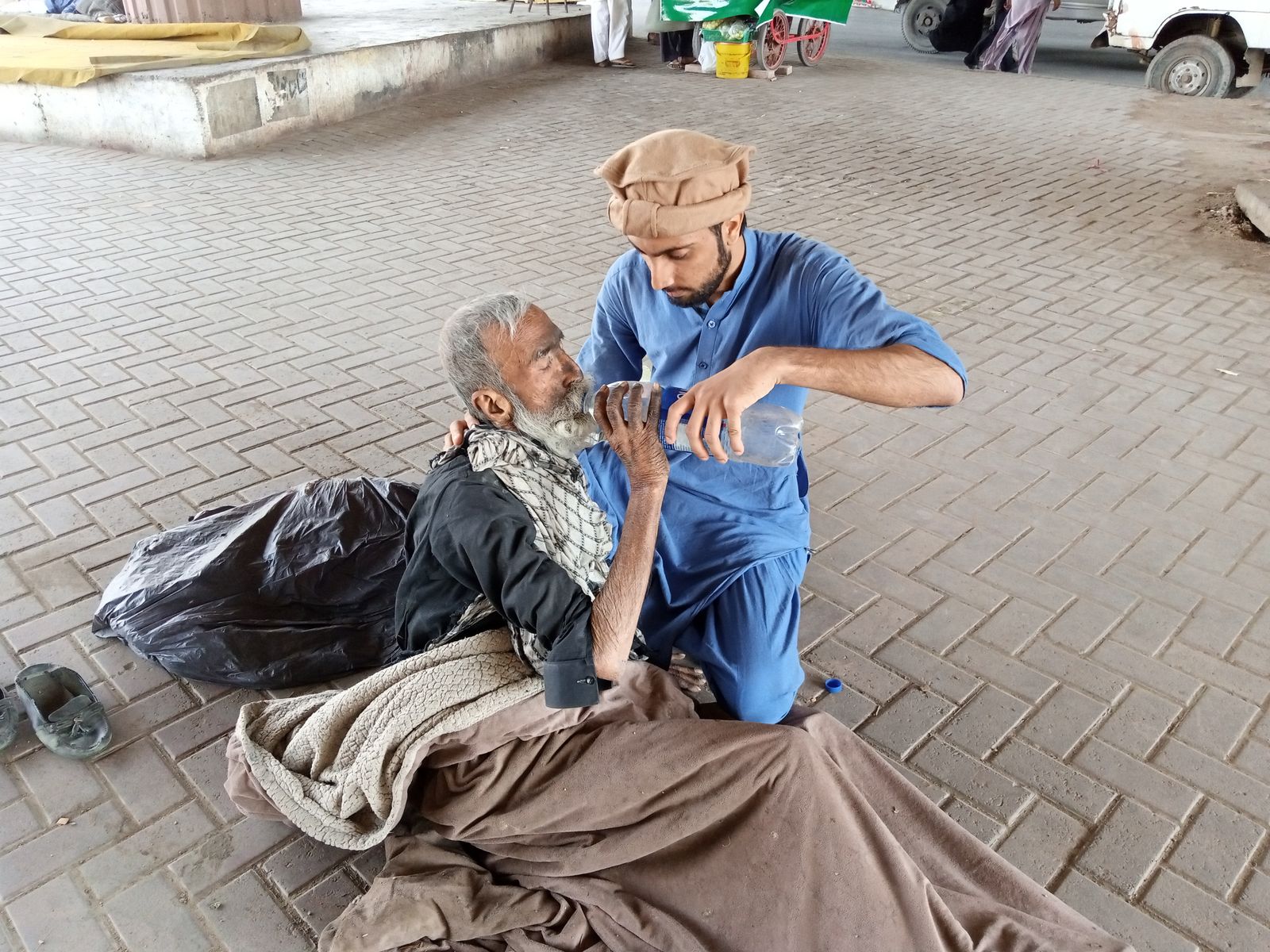 Hands giving and receiving a donation